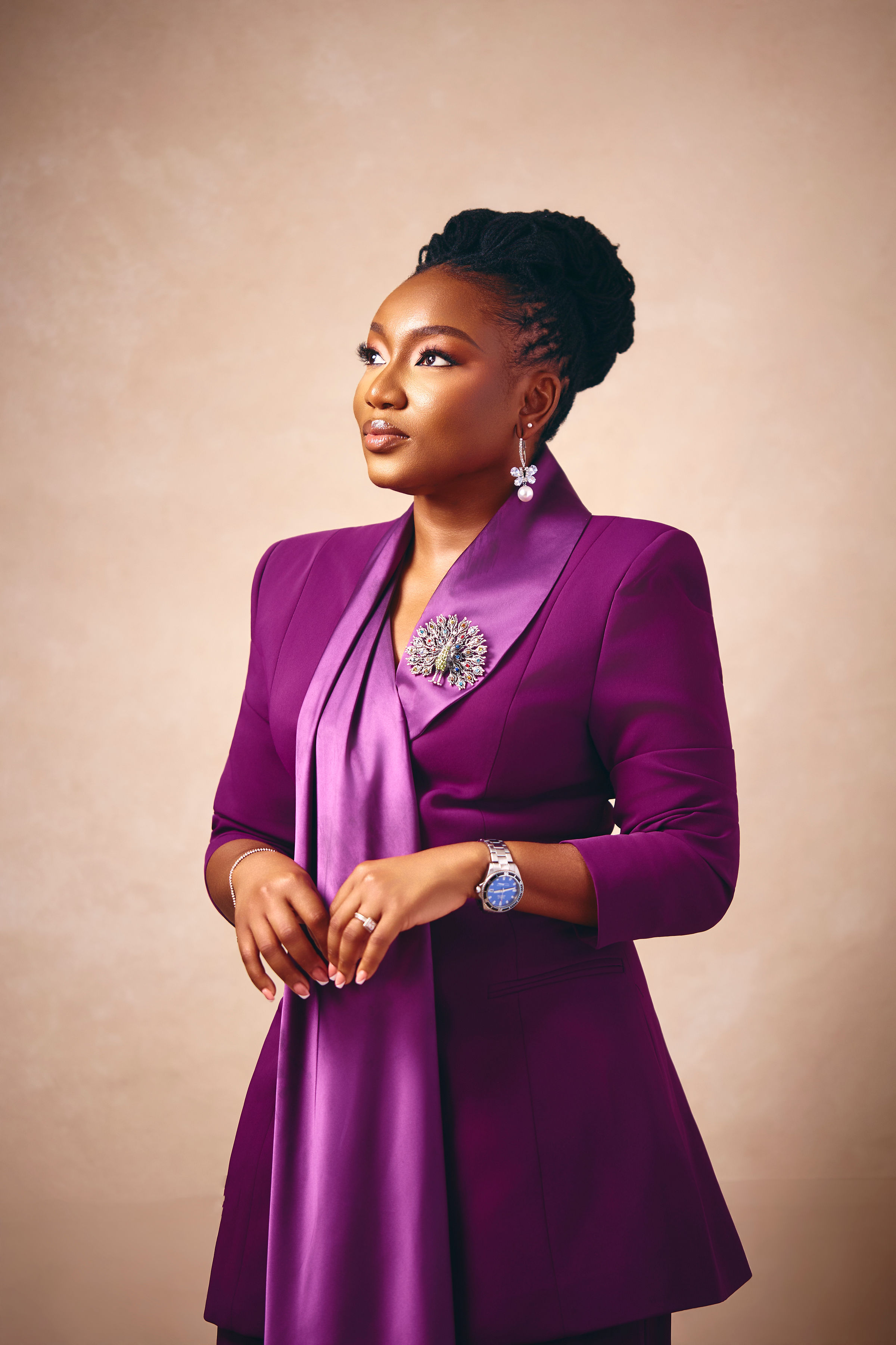 Portrait of Aramide Balogun in a purple blazer
